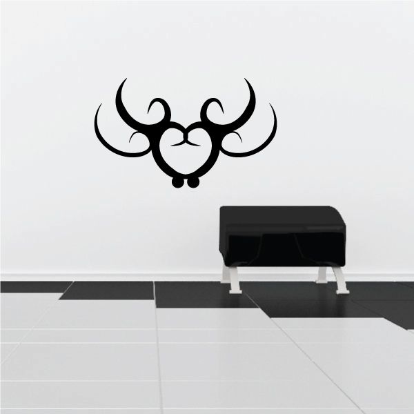 Black tribal bull head wall decal with ornate swirl horns and nose