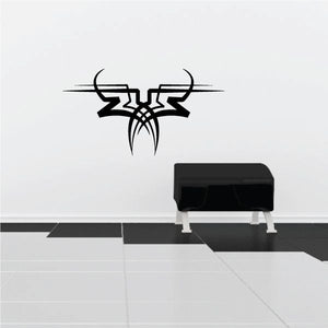 Black tribal pinstripe wall decal with antlered head icon in vinyl style