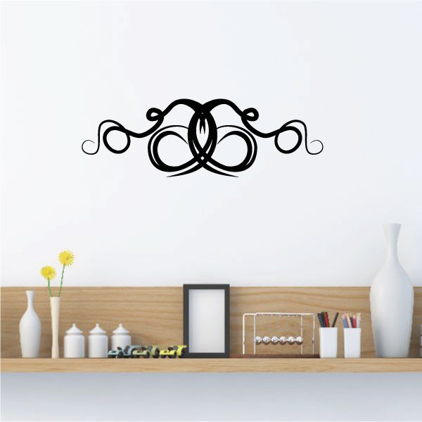Tribal wall decal with black pinstripe swirl and ornate curls centerpiece