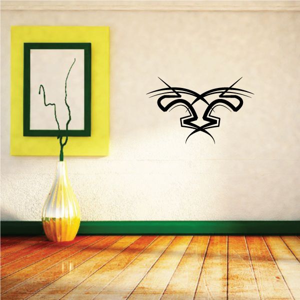 Black tribal pinstripe wall decal with bold geometric outline on wall
