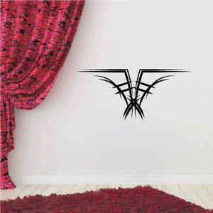Black tribal wall decal with pinstripe butterfly-wing design
