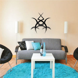 Tribal pinstripe wall decal with black star-and-spoke graphic on a light wall