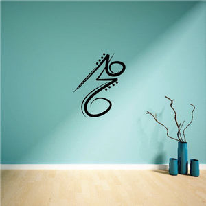 Black tribal-style wall decal with bold abstract numerals