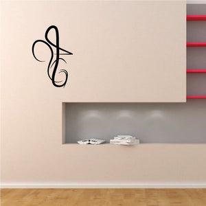 Tribal wall decal with black swirled script flourish