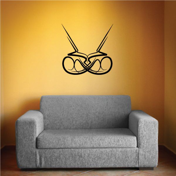 Tribal wall decal vinyl graphic of crossed arrows with circular shapes and dark lines