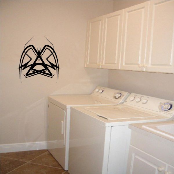 Tribal pinstripe wall decal with bold black graphic on light wall