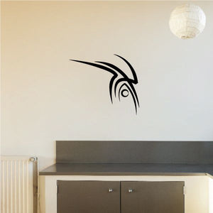 Tribal vinyl wall decal with black stylized feathered eye pattern