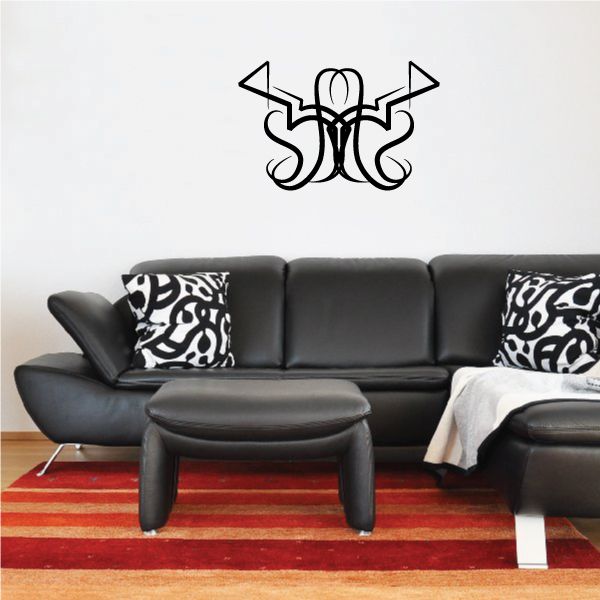 Black tribal pinstripe wall decal with arrow and swirling monogram design