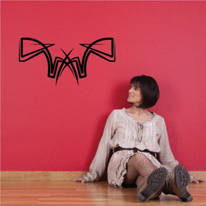 Black tribal pinstripe wall decal with symmetrical winged shapes
