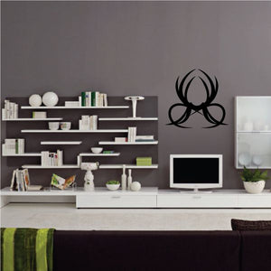 Tribal emblem wall decal with flame-like icon, black vinyl