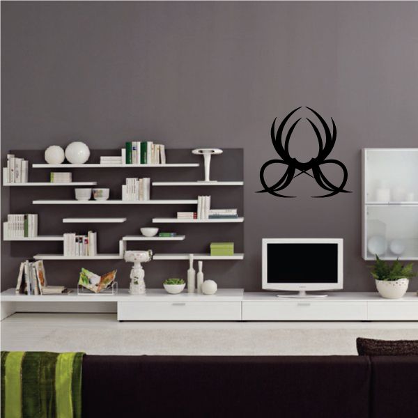 Tribal emblem wall decal with flame-like icon, black vinyl