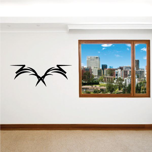 Tribal pinstripe wall decal, black stylized V-shaped wing motif.
