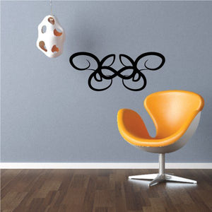 Black tribal swirl wall decal with curved vine and butterfly shapes