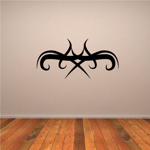 Tribal wall decal featuring black ornate cross curls