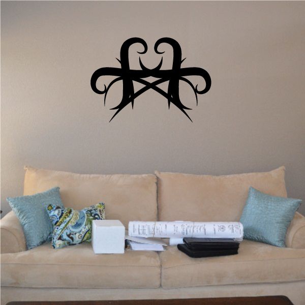 Tribal wall decal featuring black decorative cross with swirling pinstripe lines