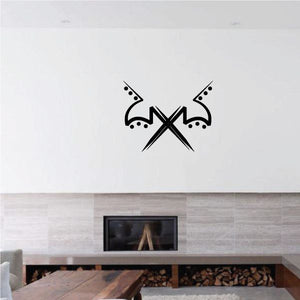 Black tribal wall decal with crossed axes and pinstripe arrow tips