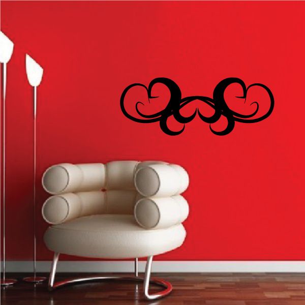 Tribal wall decal with black swirling heart-like design