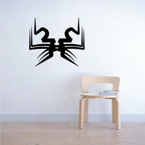 Black tribal wall decal with bold symmetrical graphic and claw-like accents