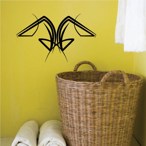 Tribal pinstripe wall decal with black stylized arrow-wing design