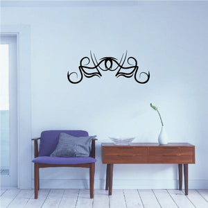 Black tribal scroll wall decal with pinstripe lines and symmetrical curls