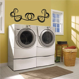 Black tribal pinstripe wall decal with ornate scroll and loop motifs