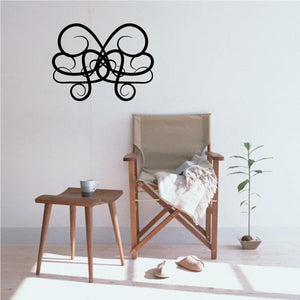Tribal pinstripe vinyl wall decal with black butterfly-like swirl outline