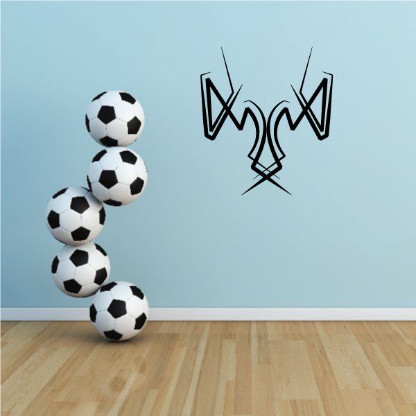 Vinyl wall decal set with black-and-white soccer balls and tribal cross design