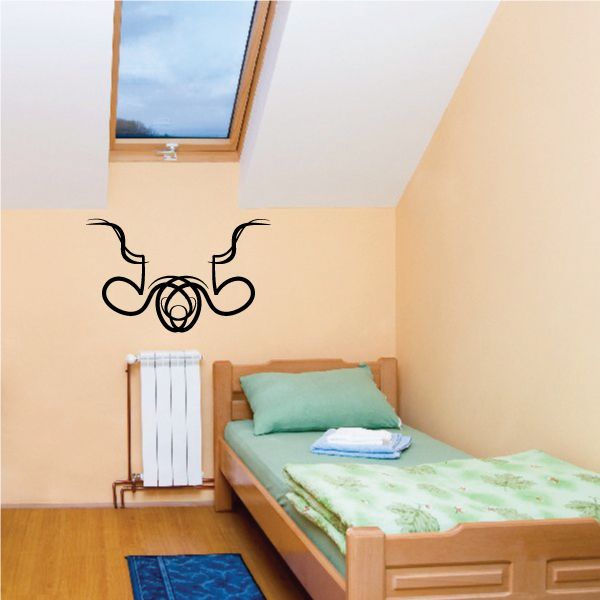 Tribal swirl wall decal in black with pinstripe-style outlines