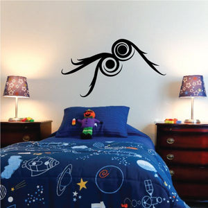 Tribal pinstripe wall decal of a black owl with circular eyes and feathered lines
