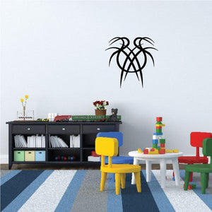 Black tribal spider wall decal with webbed legs