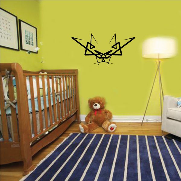 Black tribal wall decal with angular pinstripe lines and star-like shape