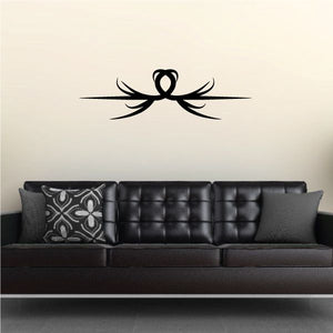 Tribal pinstripe wall decal featuring black knot and winged swirl design