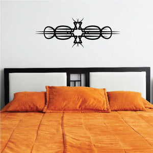 Tribal pinstripe wall decal with black star and circular line design