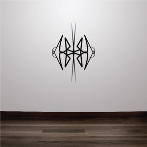 Black tribal wall decal with vertical pinstripe lines and angular emblem
