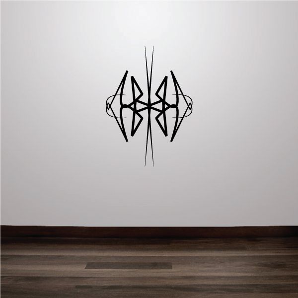 Black tribal wall decal with vertical pinstripe lines and angular emblem