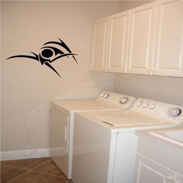 Tribal-style vinyl wall decal with black arrowhead and skull motif