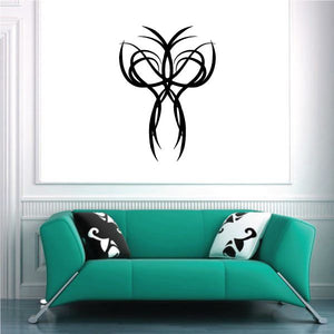 Black tribal wall decal with symmetric swirl and arrow-like center design