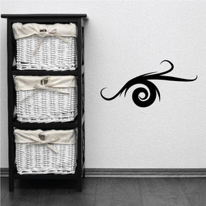 Tribal wall decal with black swirling spiral eye motif