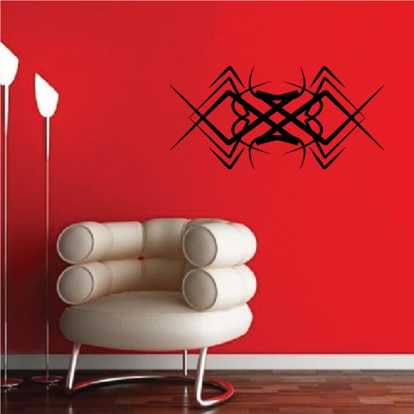 Tribal pinstripe wall decal with black graphic on red wall