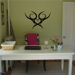 Tribal wall decal in black with abstract swirl and cross pinstripe