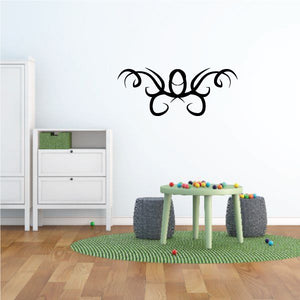 Black tribal wall decal with ornate swirls, vinyl pinstripe style