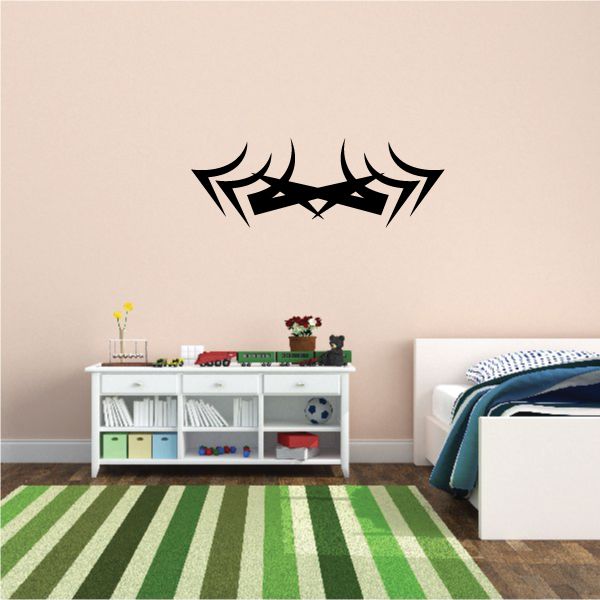 Tribal pinstripe wall decal with black stylized face graphic