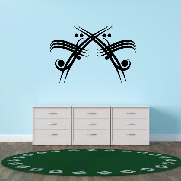 Tribal pinstripe wall decal in dark lines with crossed strokes and circular accents