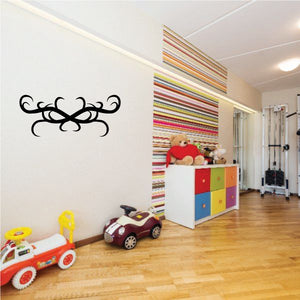 Tribal pinstripe wall decal, black ornate swirl with curved scroll design