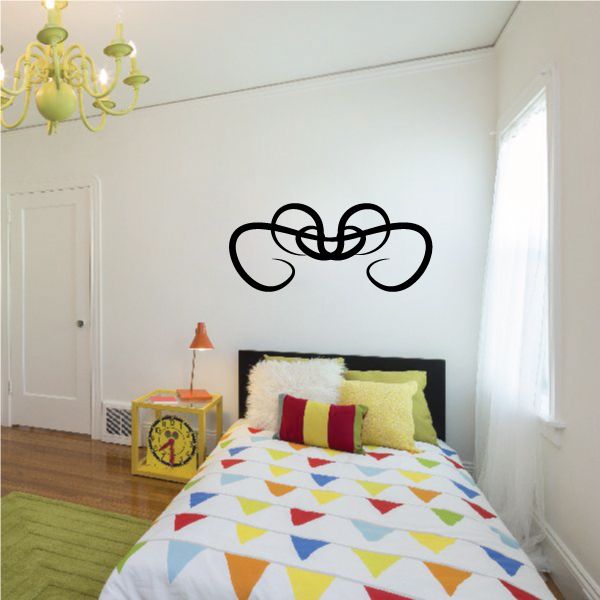 Black tribal swirl pinstripe wall decal with curved, interlocking lines