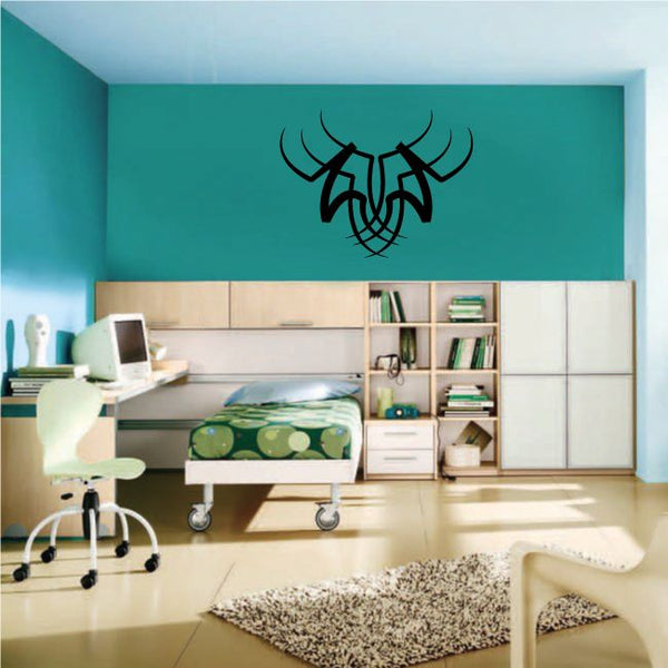 Tribal pinstripe wall decal featuring a black stylized horned face