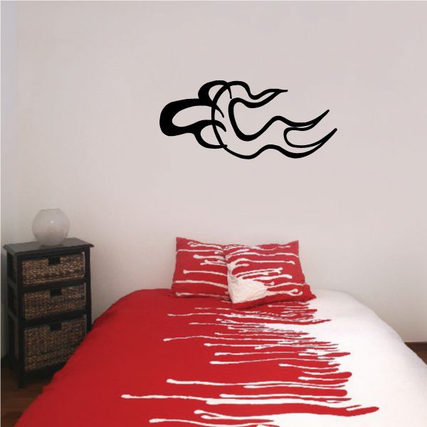 Tribal wall decal featuring a black swirl flame-style outline design