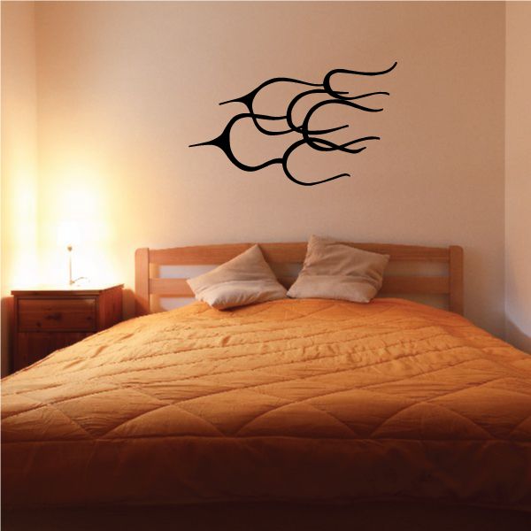 Tribal wall decal with black claw-like pattern for vinyl application