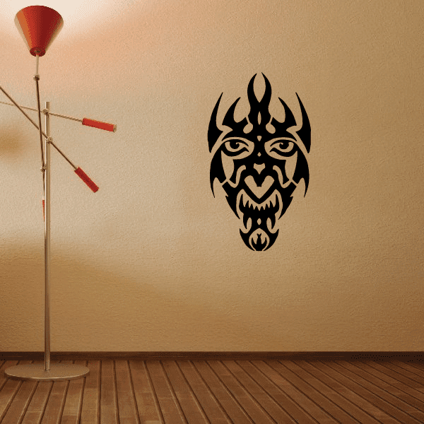 Tribal pointy mask decal with black stylized face and flames motif