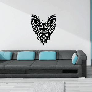 Tribal mask decal with ornate swirls and symmetrical wings, black